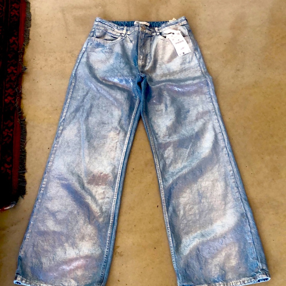 Size 8 fancy shiny 5 pocket jeans. New original condition never worn.